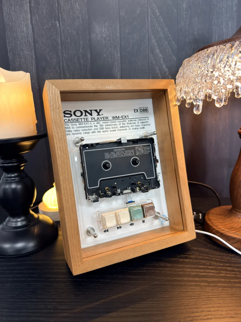 Sony Walkman WM-EX1 restored cassette player framed as playable wall art - real product photo