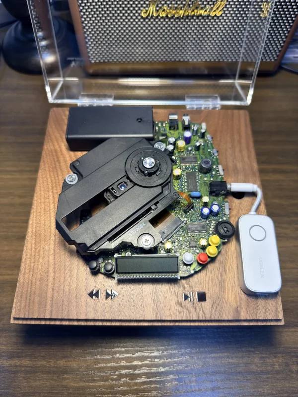 Panasonic SL-S230 mechanism Panasonic SL-S230 — close-up of the rebuilt CD mechanism in the walnut display frame